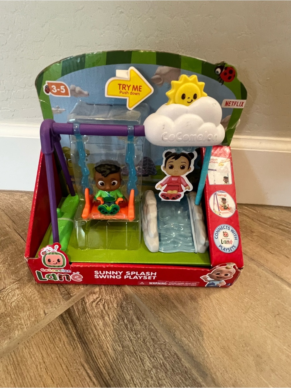 Cocomelon Lane Sunny Splash Swing Playset features a swing and a slide NiB $18